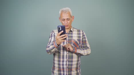 Man-making-a-video-call-on-the-phone.